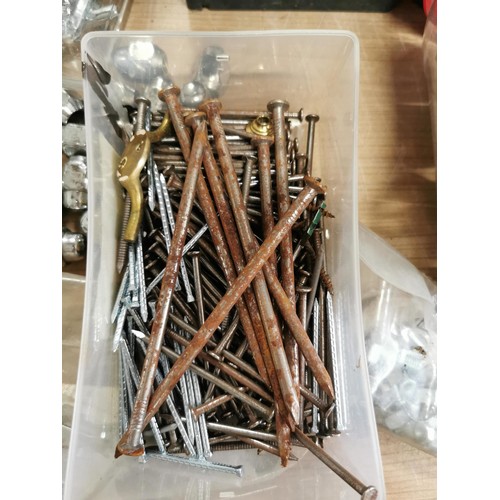 188 - Large box containing an assortment of nails, bolts, screws most in original packets