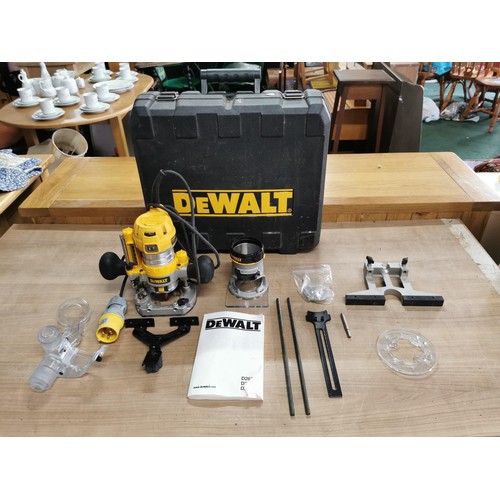 215 - Dewalt 110v router with accessories, lead and instructions in original hard case