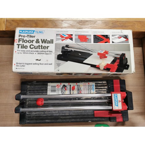 222 - Box containing a quantity of various tools inc German tile cutter, 150mm bench grinder, hammers, fil... 