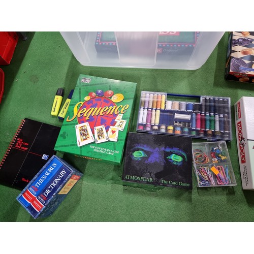 76 - A box full of various board games and a boxed 99 piece toolkit in a car formed case, to include mono... 