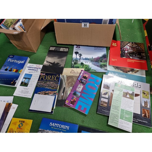 80 - A large quantity of books and tourist pamphlets, along with a good quality black jewellery case with... 