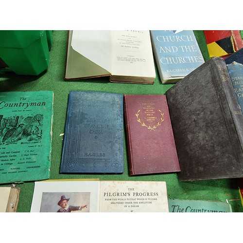 83 - A large quantity in 4 boxes of mostly antique books to include many religious Books, bible, etc, alo... 