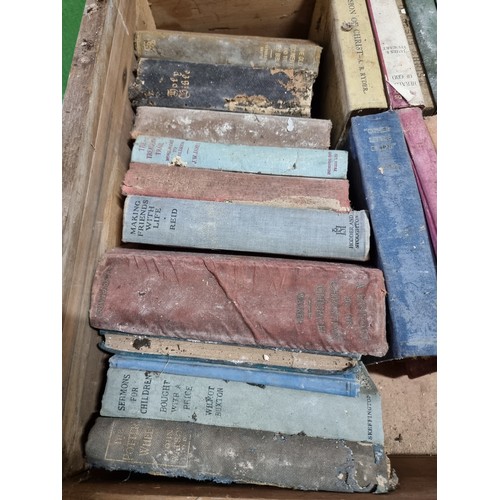 83 - A large quantity in 4 boxes of mostly antique books to include many religious Books, bible, etc, alo... 