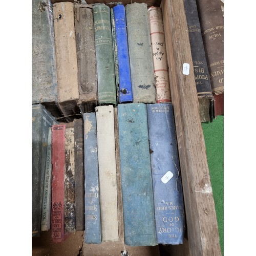 83 - A large quantity in 4 boxes of mostly antique books to include many religious Books, bible, etc, alo... 