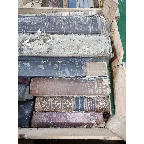 83 - A large quantity in 4 boxes of mostly antique books to include many religious Books, bible, etc, alo... 