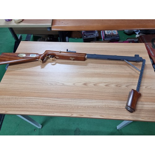 321 - A very nice quality handmade .177 pump action air rifle with a bolt action style loading. This was a... 