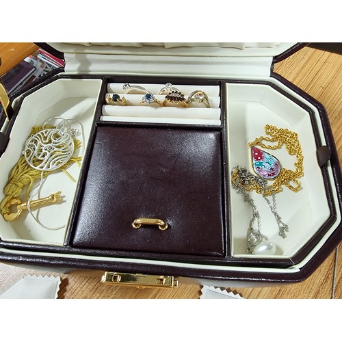 326 - A large quantity of good quality costume jewellery fitted in 5 jewellery boxes to include many good ... 