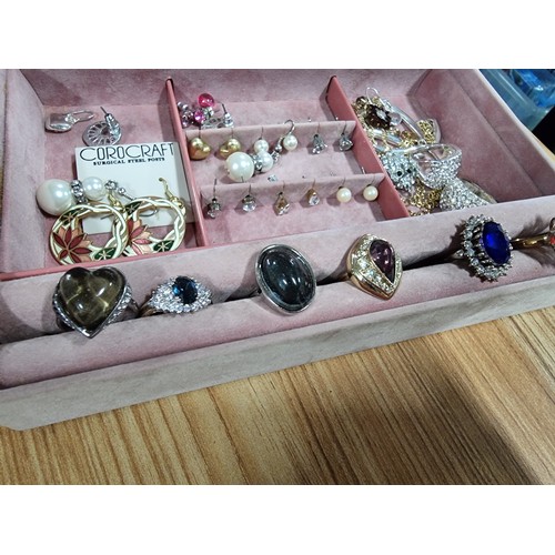 326 - A large quantity of good quality costume jewellery fitted in 5 jewellery boxes to include many good ... 