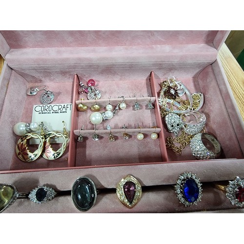 326 - A large quantity of good quality costume jewellery fitted in 5 jewellery boxes to include many good ... 