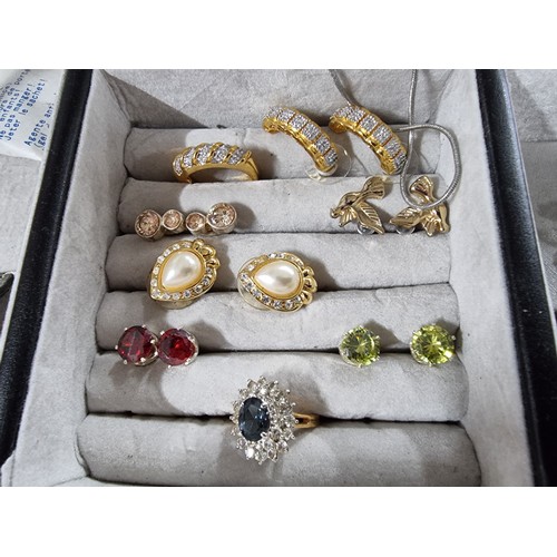 326 - A large quantity of good quality costume jewellery fitted in 5 jewellery boxes to include many good ... 