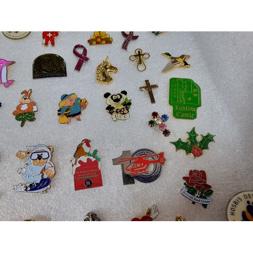 327 - A very large collection of over 100x various pin brooches covering various subjects including Mickey... 