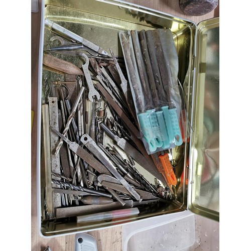 234 - Large quantity of sledge and lump hammers along with a vintage first aid tin containing drill bits e... 