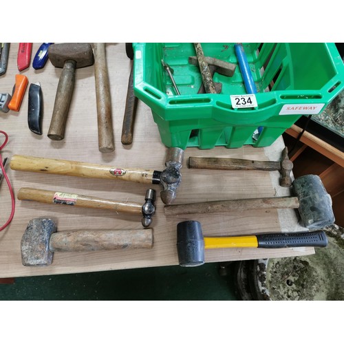 234 - Large quantity of sledge and lump hammers along with a vintage first aid tin containing drill bits e... 