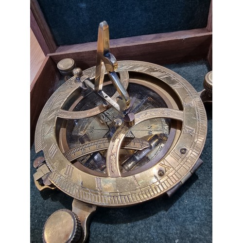 329 - A wooden cased brass sun dial compass by Gilbert&Sons London, fitted in a good quality brass bound w... 