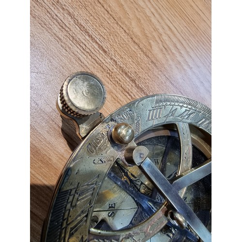 329 - A wooden cased brass sun dial compass by Gilbert&Sons London, fitted in a good quality brass bound w... 