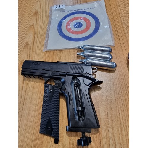 331 - A .177 gas powered BB gun by powerline Japan in good condition with targets and metal BB's included.