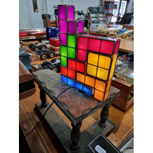 332 - A genuine Tetris lamp, made up of 7 Tetris pieces which light up on connection can be formed to make... 