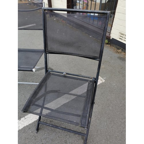 245 - 4x foldable garden outdoor chairs, one is chrome and black.