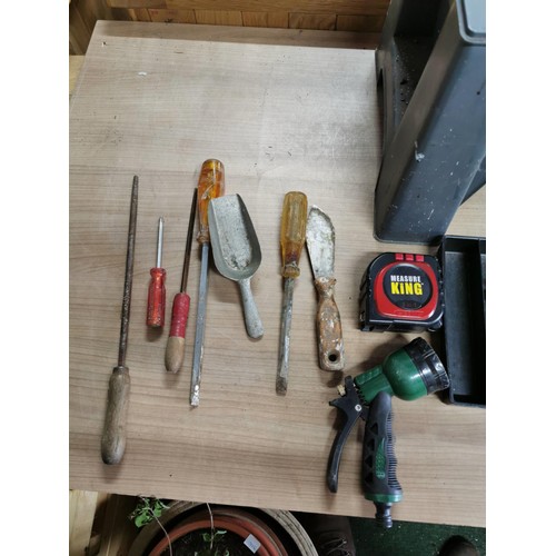 251 - Step up gardening  storage box cotaining a quantity of tools inc chisels, screwdrivers, hose pipe en... 