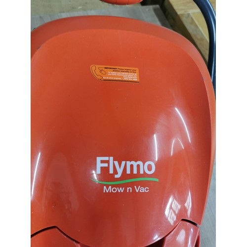 253 - Electric flymo hover mower in full working order complete with cable