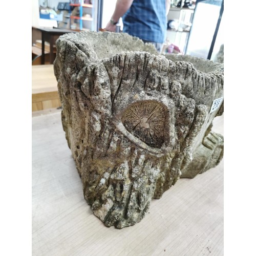 256 - Large and very heavy stoneware planter with tree stump design in good order height 30cm high 40cm de... 