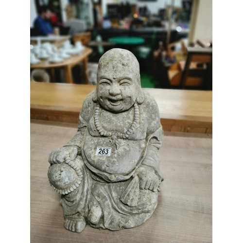 263 - Large concrete Buddha garden figure in good order stands at 43cm high, 29cm wide, 28cm deep