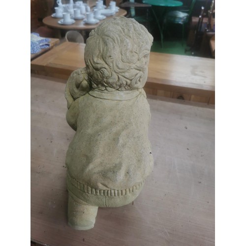 265 - Large garden stone ornament of a boy with his dog in good order stands at 41cm high, 31cm wide