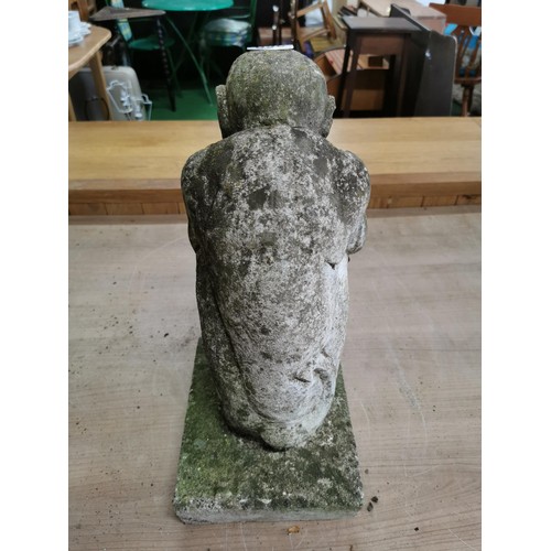 269 - Stoneware garden ornament of a speak no evil figure in good order stands at 43cm high, 19cm wide and... 