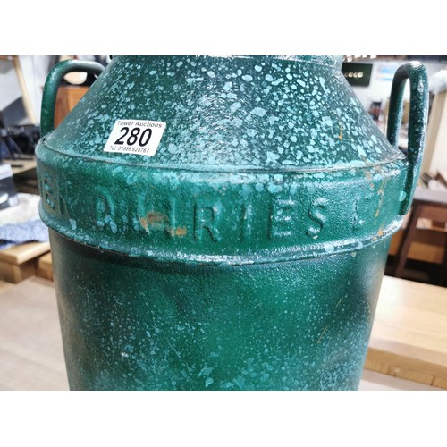 280 - Good quality vintage green painted milk churn stamped Bladen Dairies Ltd around the edge in good ord... 