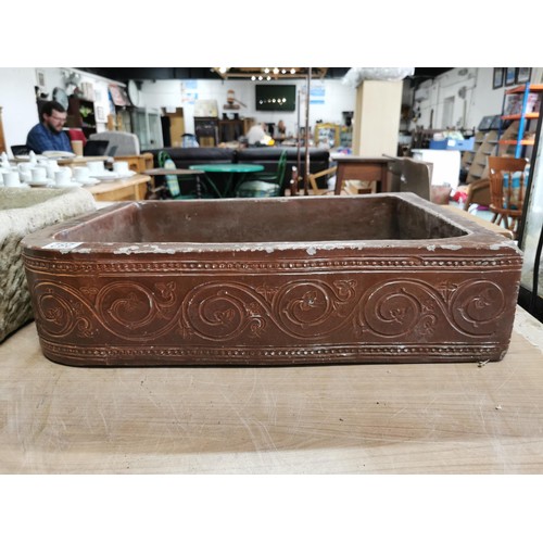 282 - Unusual brown glazed belfast corner sink in good order with swirl decoration around the sides, heigh... 