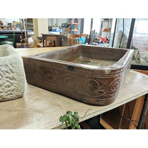 282 - Unusual brown glazed belfast corner sink in good order with swirl decoration around the sides, heigh... 