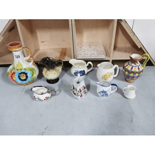 427 - Collection of 9x ceramic jugs inc grindley jug, italian jug etc largest piece measures 29cm high