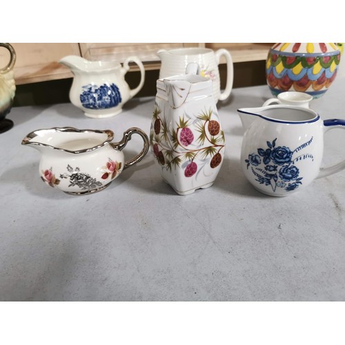 427 - Collection of 9x ceramic jugs inc grindley jug, italian jug etc largest piece measures 29cm high