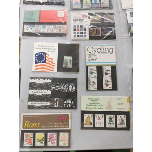 295 - Large quantity of British stamp presentation pack with stamp silks, inc locomotive stamp presentatio... 