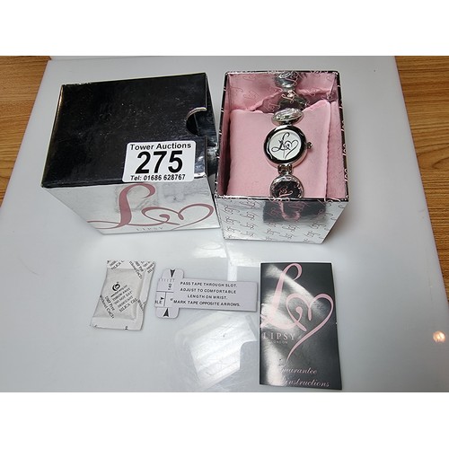 348 - A as new boxed Lipsy London ladies fashion watch with a gemstone style bracelet with its paperwork.