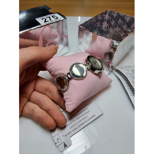 348 - A as new boxed Lipsy London ladies fashion watch with a gemstone style bracelet with its paperwork.