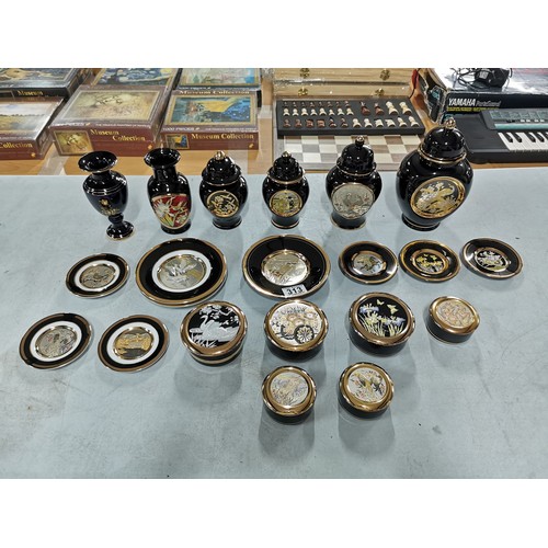 313 - Quantity of Black Chokin china items inc 9x plates, 6x trinket boxes with lids, 1x urn, 4x ginger po... 