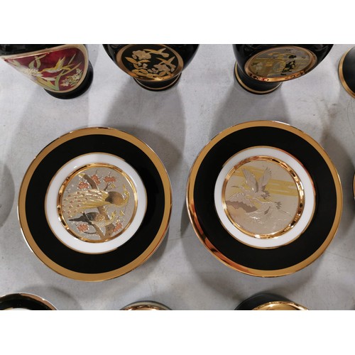 313 - Quantity of Black Chokin china items inc 9x plates, 6x trinket boxes with lids, 1x urn, 4x ginger po... 