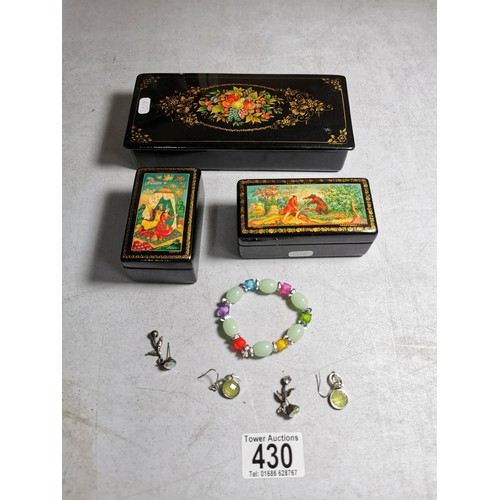 430 - Collection of 3x russian lacquered boxes with nice colourful designs all boxes are signed in Russian... 