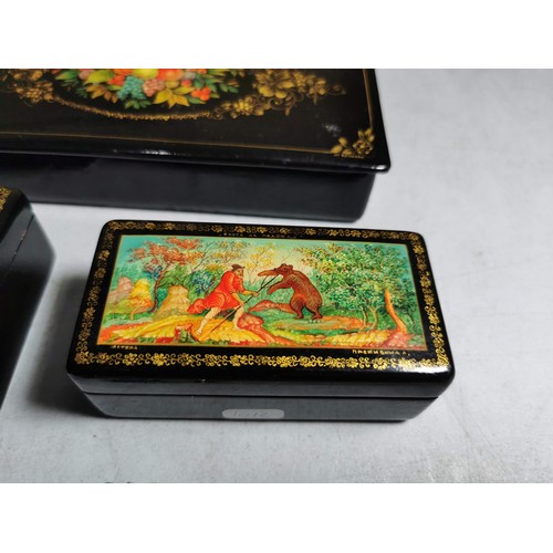 430 - Collection of 3x russian lacquered boxes with nice colourful designs all boxes are signed in Russian... 