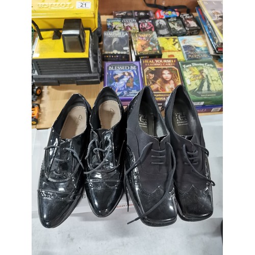 444 - Box of collectables inc boxed fitbit, 3x pairs of shoes sizes 39 and 41 inc a pair of Corine black a... 