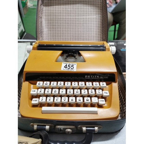 455 - Quantity of collectables inc a Petite international delux typewriter in original case along with a d... 