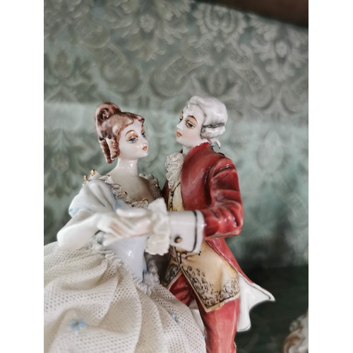 460 - 2x Capodimonte ceramic 18th century ornate figurines stamped to the base, with lace work dresses, on... 