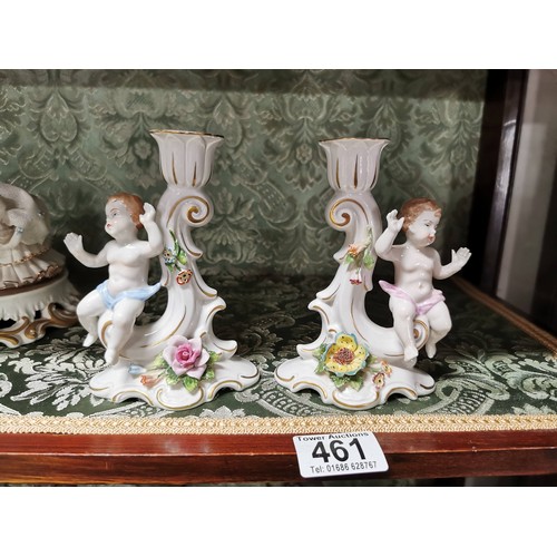 461 - A pair of Capodimonte cherubs candle holders one is AF otherwise in good order stamped to the base, ... 