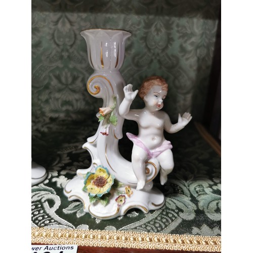 461 - A pair of Capodimonte cherubs candle holders one is AF otherwise in good order stamped to the base, ... 