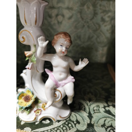 461 - A pair of Capodimonte cherubs candle holders one is AF otherwise in good order stamped to the base, ... 