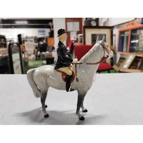 462 - Dappled grey Beswick horse with female rider, stamped underneath, a well done repair to the hind leg... 