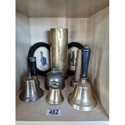 482 - Mixed lot including a pair of framed silhouettes, and trench art, pair of WW2 torches, collection of... 