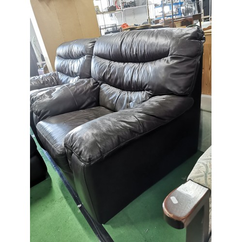 491 - 2x dark brown faux leather chairs with a storage pouffe in good order, chairs measure 90cm high 104c... 