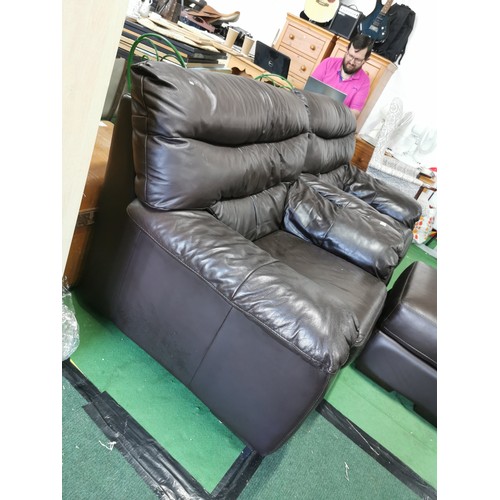 491 - 2x dark brown faux leather chairs with a storage pouffe in good order, chairs measure 90cm high 104c... 